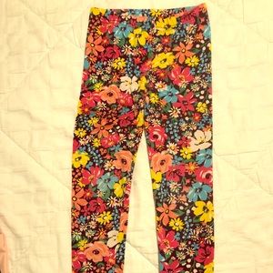Worn once S5 girls flowered leggings